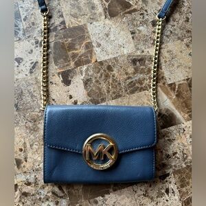 Michael Kors - crossbody bag in navy, magnetic closure, yellow gold tone detail.